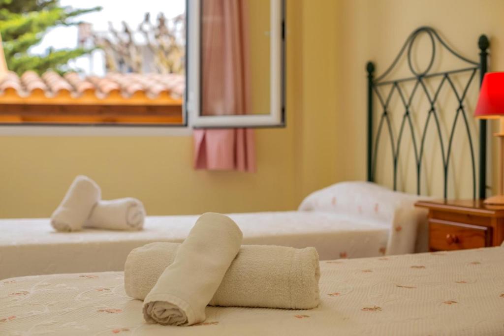 Postel nebo postele na pokoji v ubytování Villa Francisca