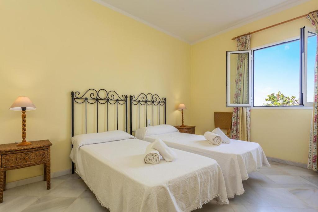 Postel nebo postele na pokoji v ubytování Villa Francisca