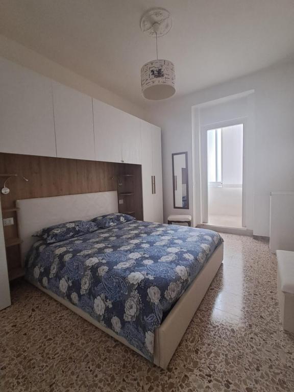 Postel nebo postele na pokoji v ubytování Camera Alghero Centro