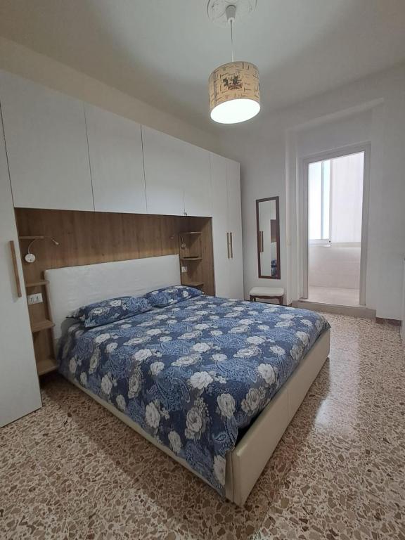 Postel nebo postele na pokoji v ubytování Camera Alghero Centro
