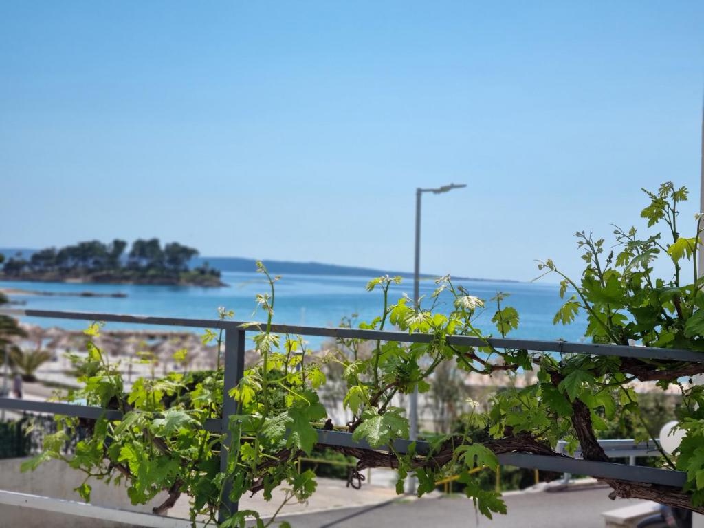 a view of the ocean from a balcony at Apartment Lučka in Rab