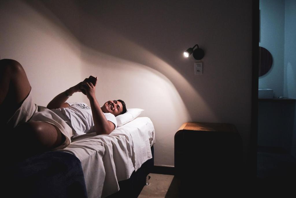 Postel nebo postele na pokoji v ubytování Local Hostel Novo Airão