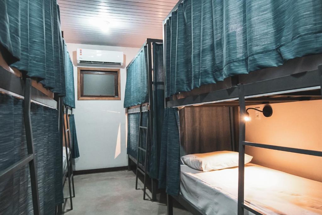 Postel nebo postele na pokoji v ubytování Local Hostel Novo Airão