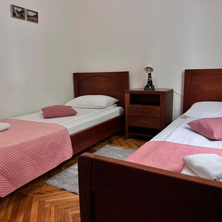Postel nebo postele na pokoji v ubytování Hotel Paviljon
