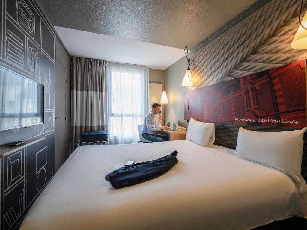 Postel nebo postele na pokoji v ubytování ibis Montargis