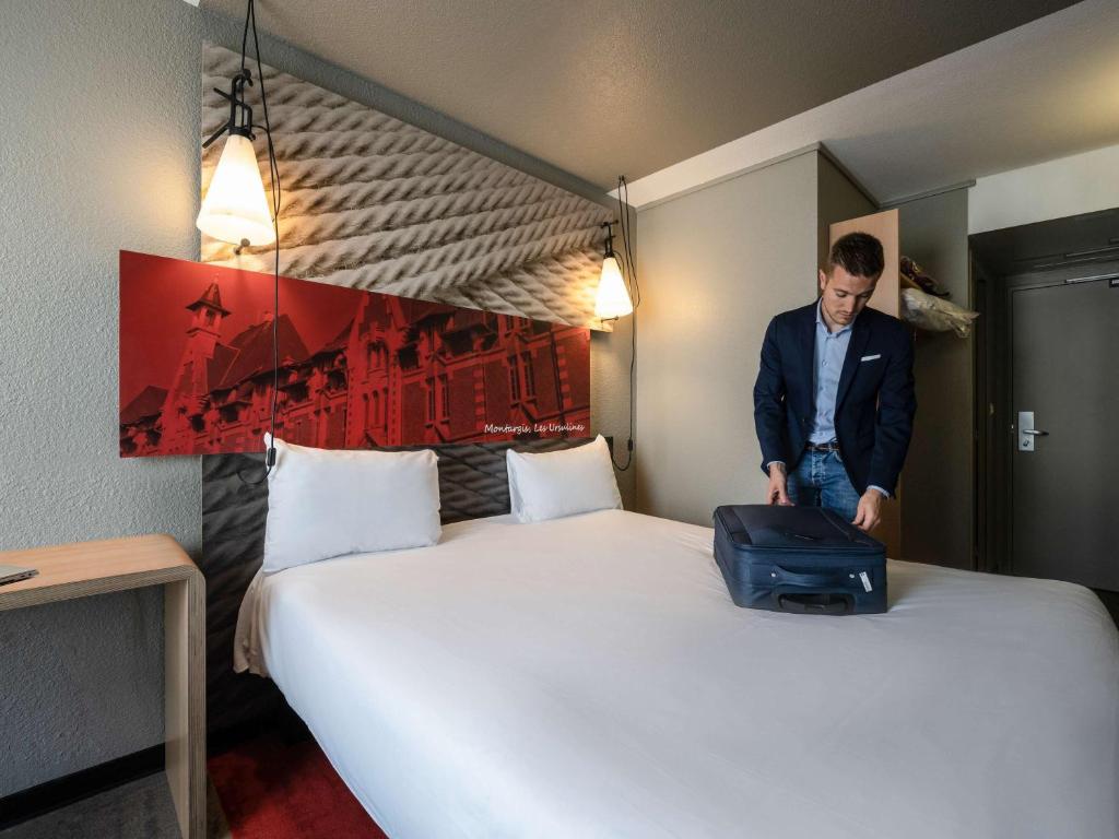 Postel nebo postele na pokoji v ubytování ibis Montargis