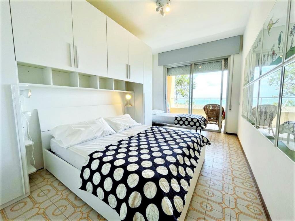 A bed or beds in a room at Nice apartment in Porto Santa Margherita with terrace