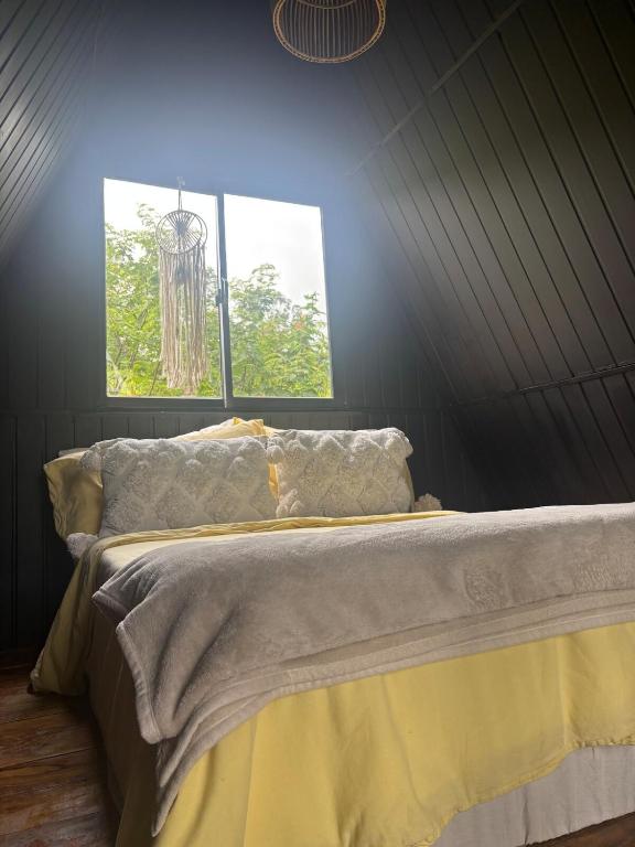 Postel nebo postele na pokoji v ubytování The ZenDen