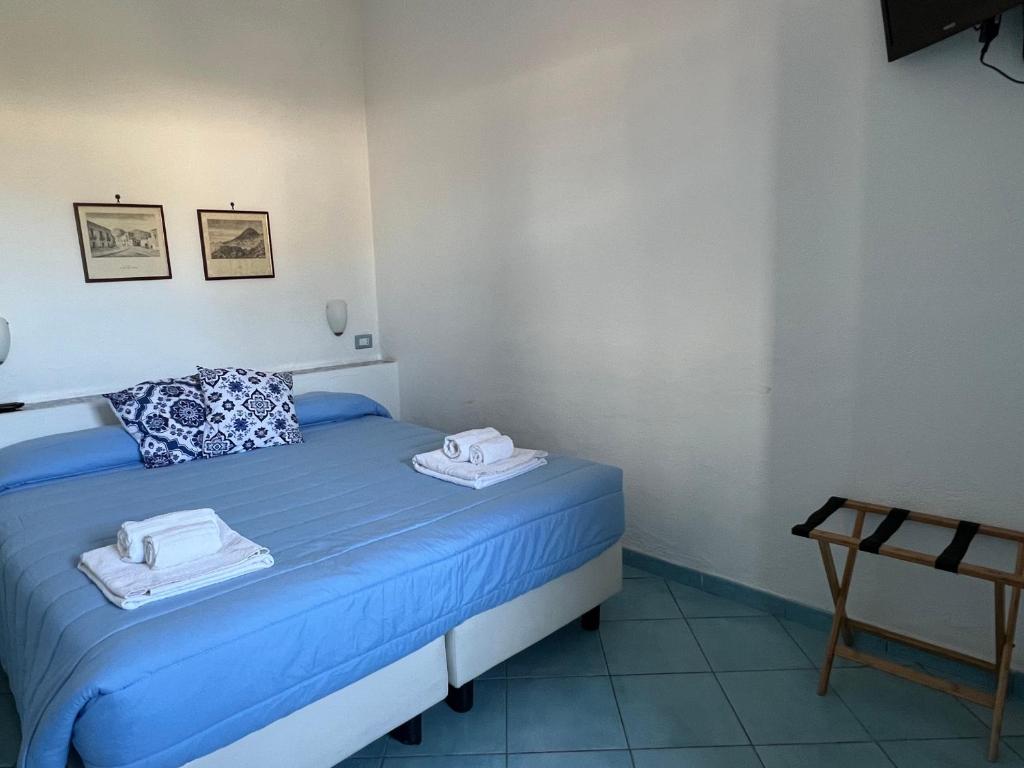 Postel nebo postele na pokoji v ubytování La Giara