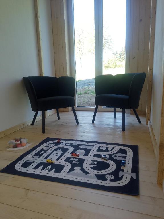 Posezení v ubytování Útulný apartmán Vážka u Pastvinské přehrady v Orlických horách