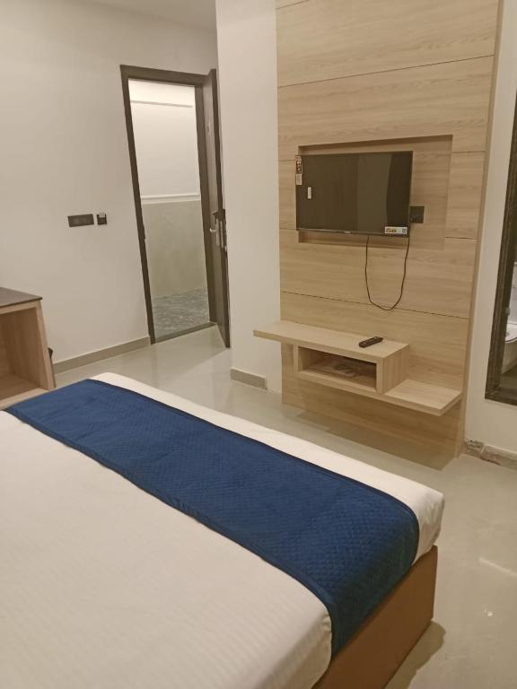 TV a/nebo společenská místnost v ubytování Hotel Grand Empire