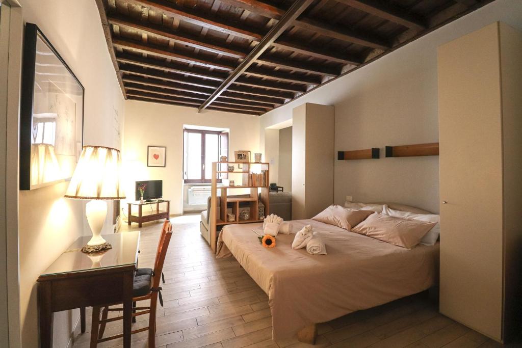 Una cama o camas en una habitación de Ciambella Cozy Flat