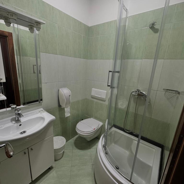 Koupelna v ubytování Hotel Paviljon