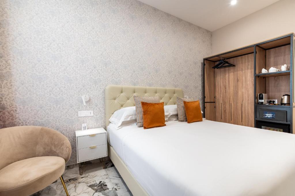 Postel nebo postele na pokoji v ubytování 69 Suite Boutique