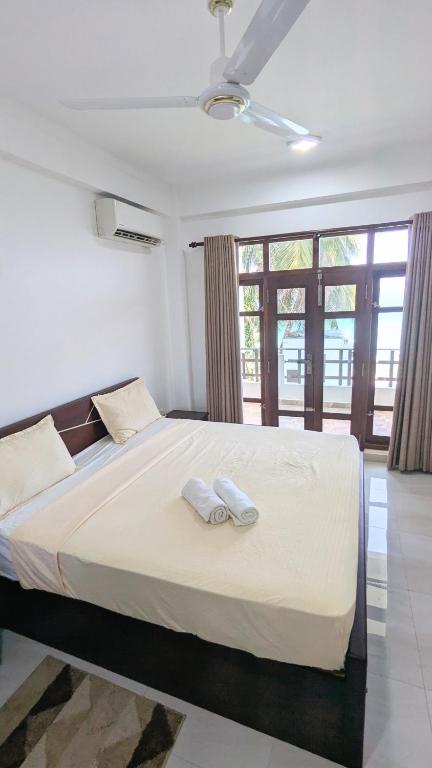 Postel nebo postele na pokoji v ubytování Dutch Villa - Trincomalee