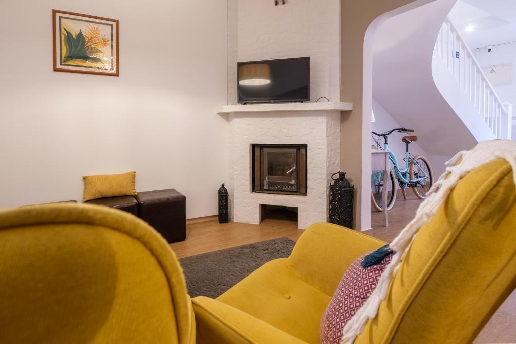 Victória Guest Houseにあるテレビまたはエンターテインメントセンター