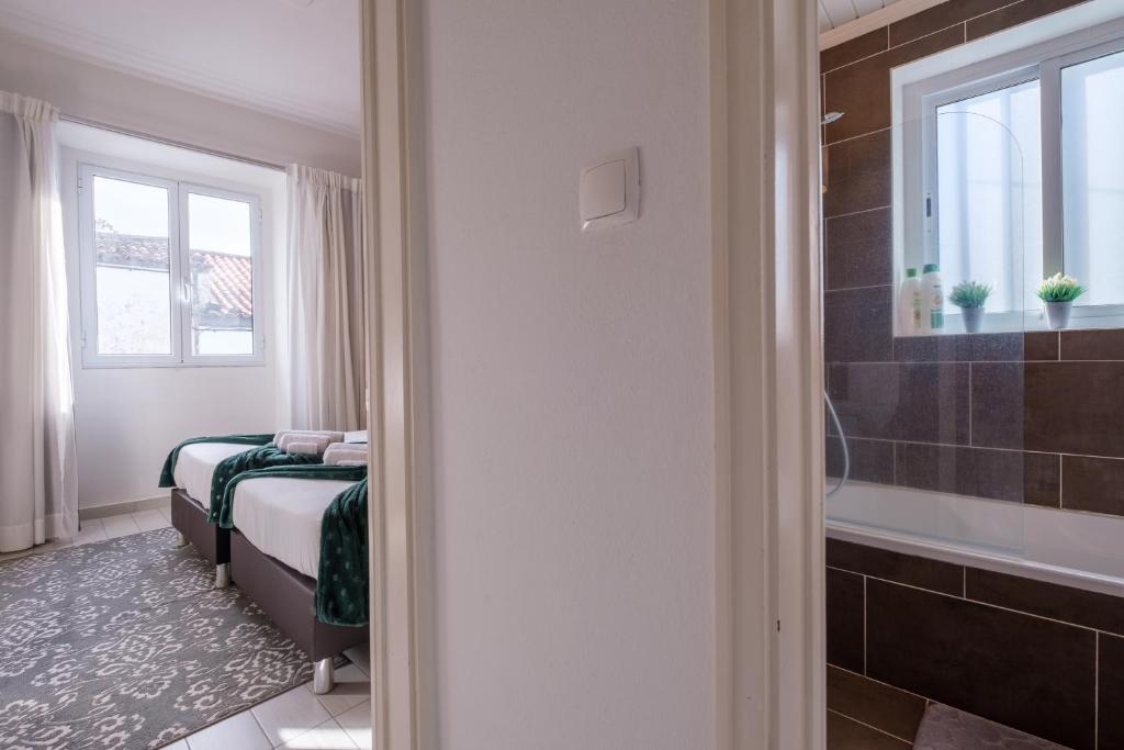 Victória Guest Houseにあるベッド