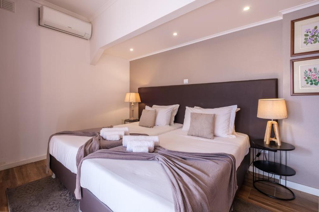 Victória Guest Houseにあるベッド