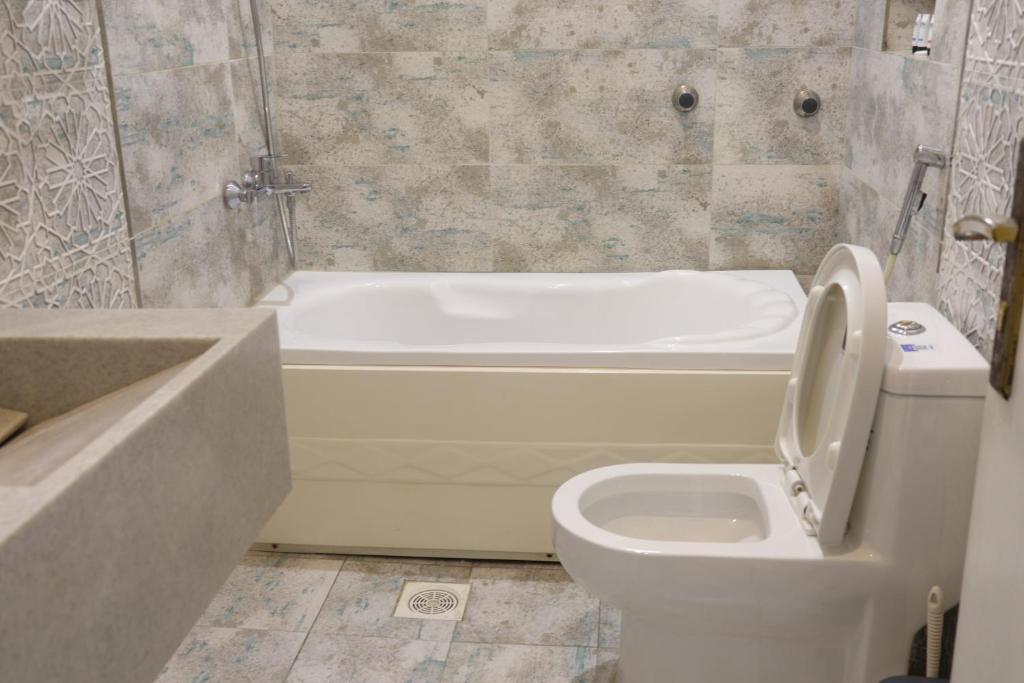 Koupelna v ubytování Areen Al Naeem Served Apartments