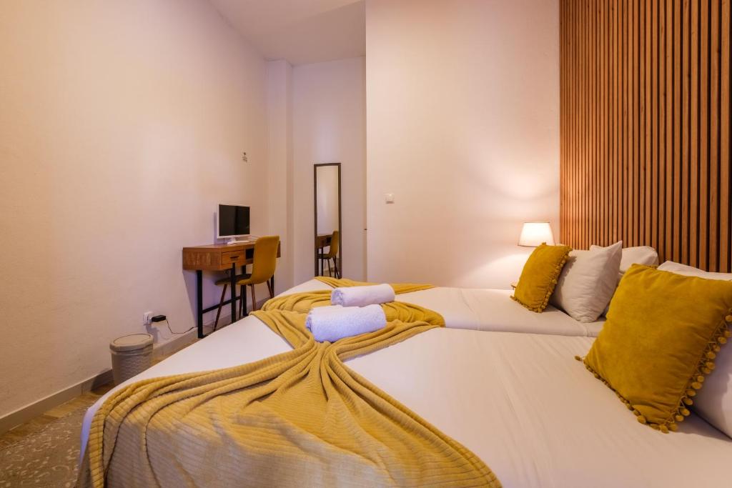 Victória Guest Houseにあるベッド