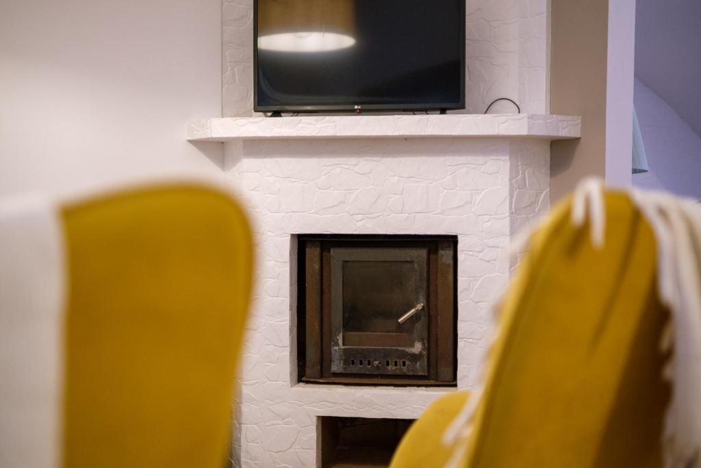Victória Guest Houseにあるテレビまたはエンターテインメントセンター