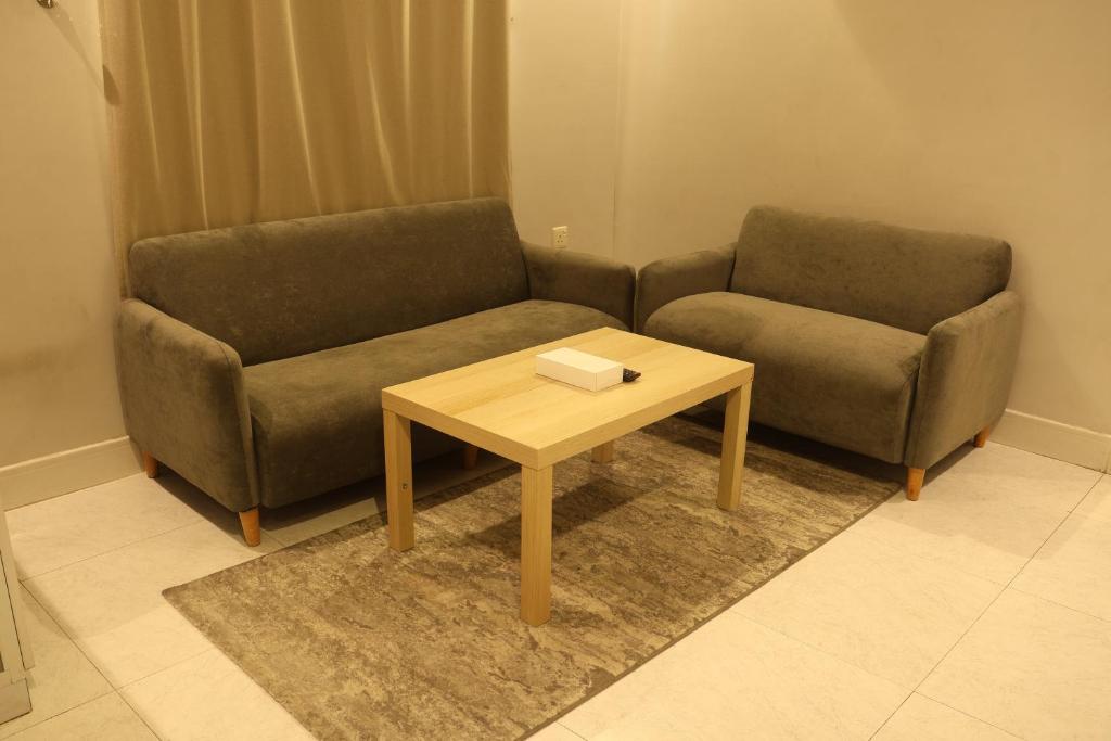 Posezení v ubytování Areen Al Naeem Served Apartments