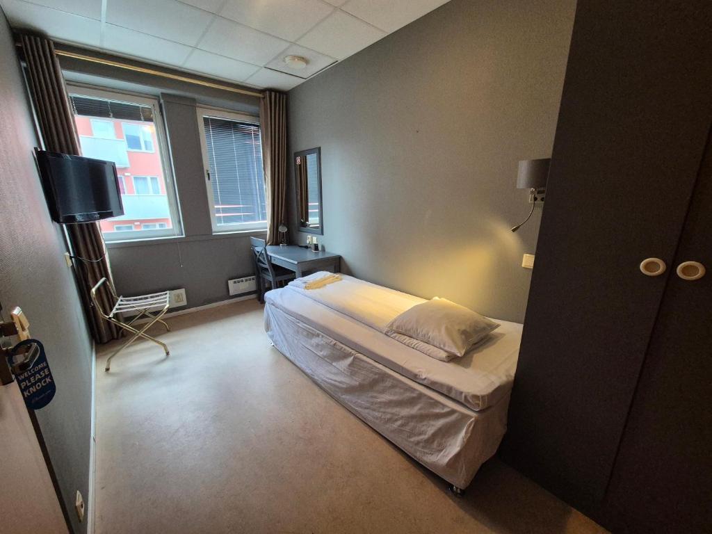 Postel nebo postele na pokoji v ubytování Hotel Expo Stockholm