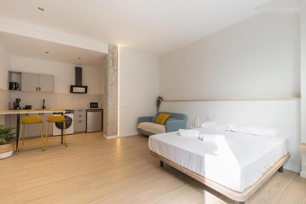 Ένα ή περισσότερα κρεβάτια σε δωμάτιο στο Cozy & Stylish APT,Santa Bárbara Castle,Wifi,AC