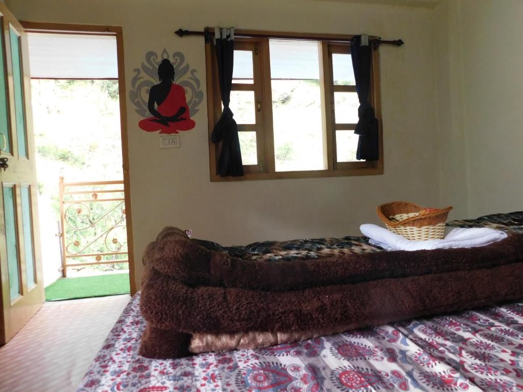 Postel nebo postele na pokoji v ubytování The Sigiriya Old manali
