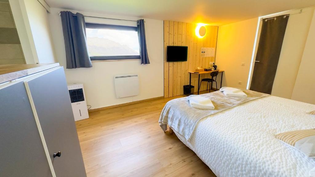 Postel nebo postele na pokoji v ubytování AlpiZen centre de Ressourcement