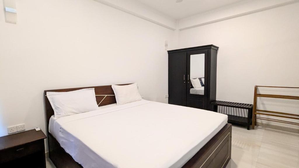 Postel nebo postele na pokoji v ubytování Dutch Villa - Trincomalee