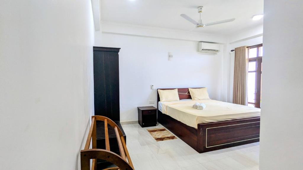 Postel nebo postele na pokoji v ubytování Dutch Villa - Trincomalee