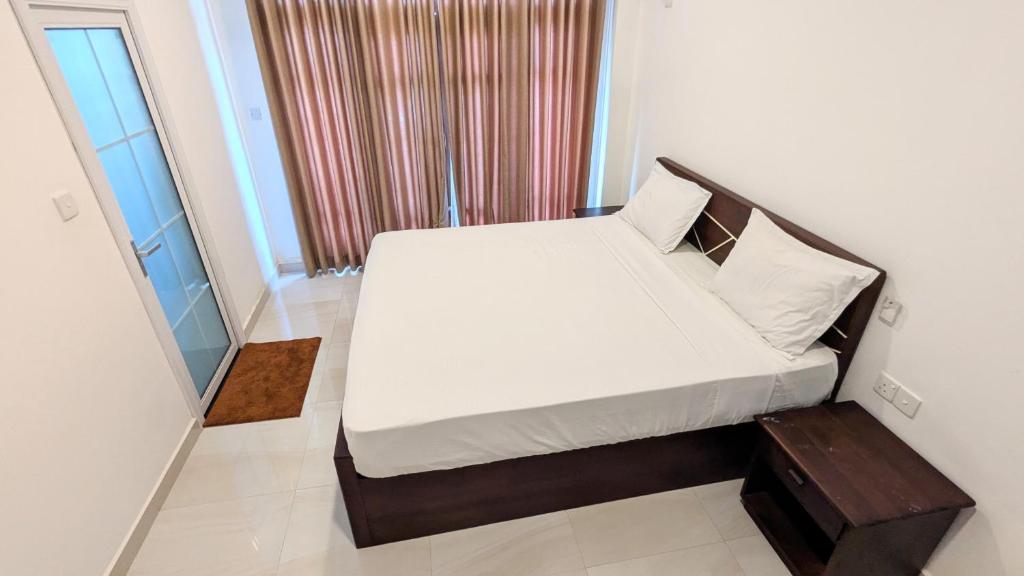 Postel nebo postele na pokoji v ubytování Dutch Villa - Trincomalee