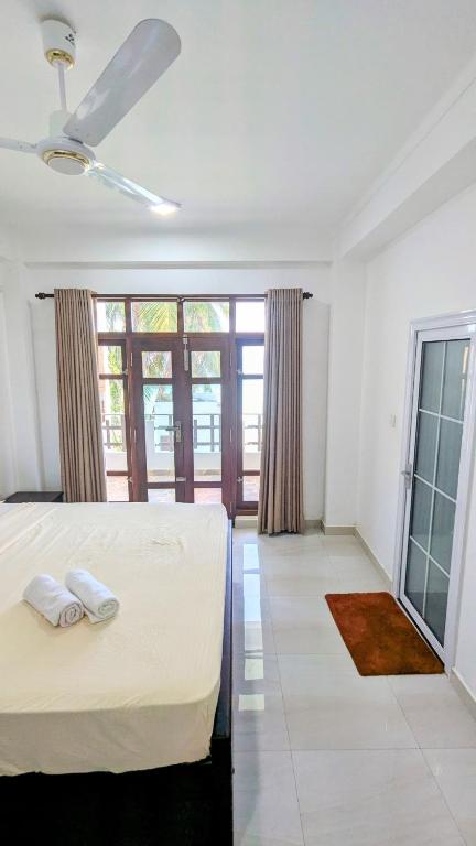 Postel nebo postele na pokoji v ubytování Dutch Villa - Trincomalee