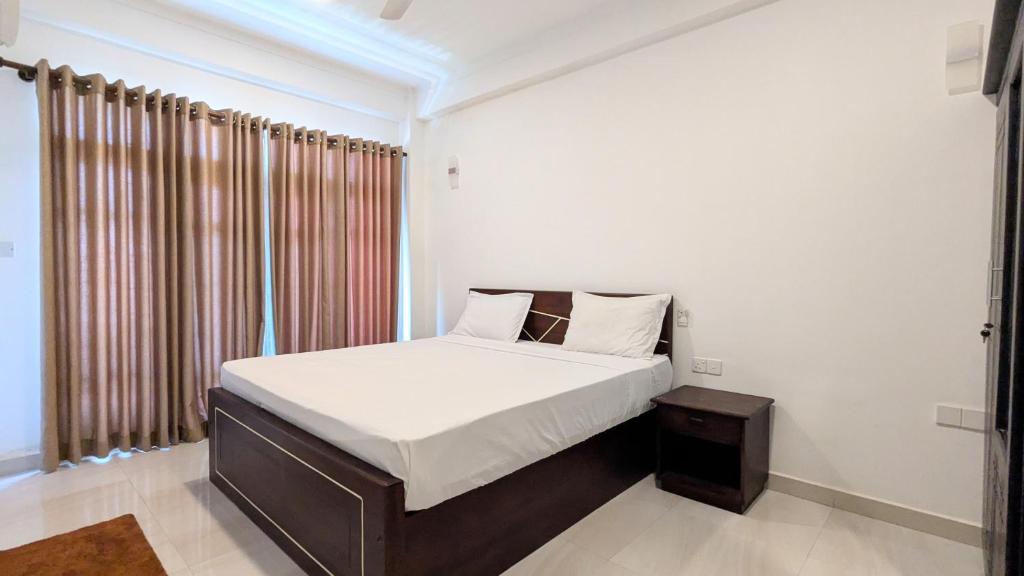 Postel nebo postele na pokoji v ubytování Dutch Villa - Trincomalee