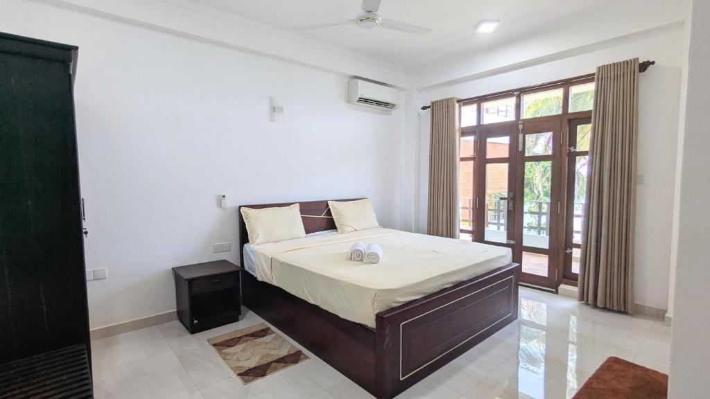 Postel nebo postele na pokoji v ubytování Dutch Villa - Trincomalee