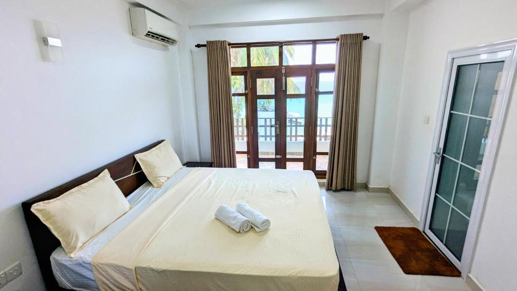Postel nebo postele na pokoji v ubytování Dutch Villa - Trincomalee