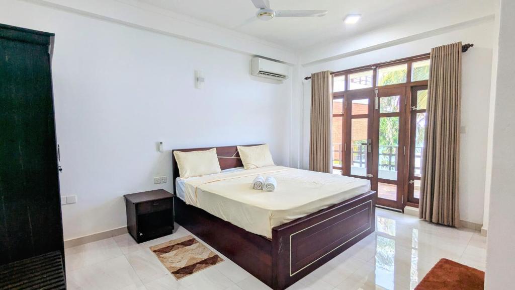 Postel nebo postele na pokoji v ubytování Dutch Villa - Trincomalee
