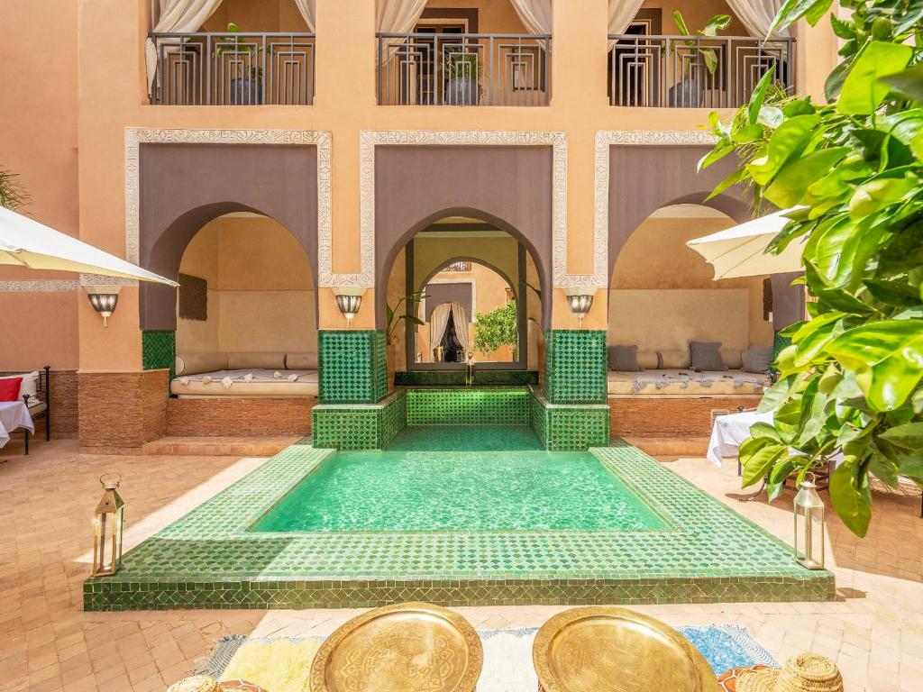 Bazén v ubytování Le Riad Medina Privilège and Spa nebo v jeho okolí