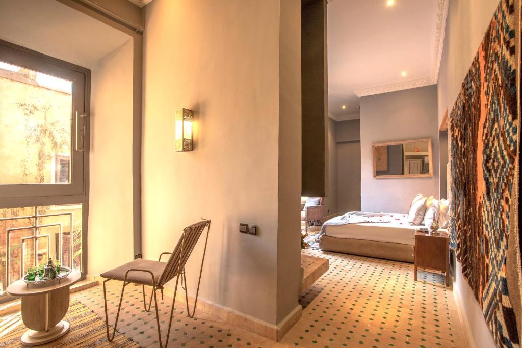 Postel nebo postele na pokoji v ubytování Le Riad Medina Privilège and Spa