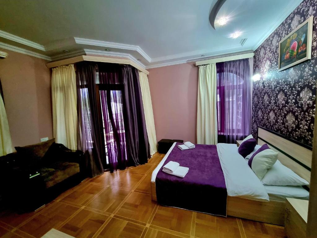 Postel nebo postele na pokoji v ubytování Rubin Hotel