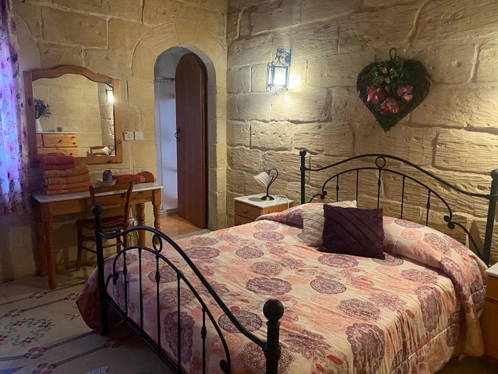 Postel nebo postele na pokoji v ubytování Barumbara Farmhouse