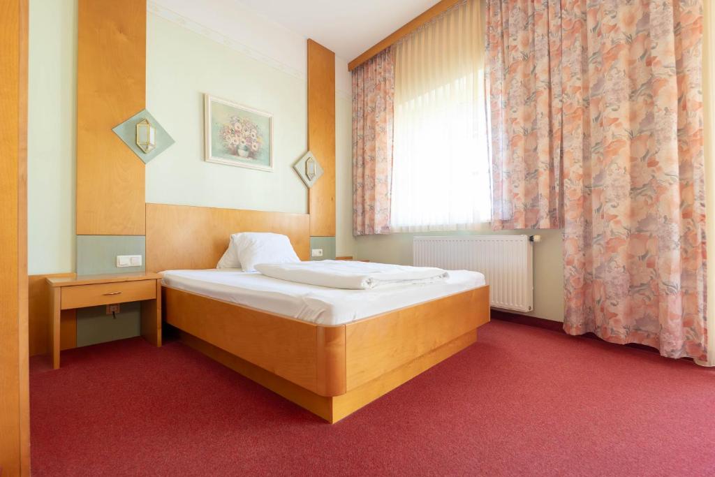 Postel nebo postele na pokoji v ubytování Panoramahof Ziegler