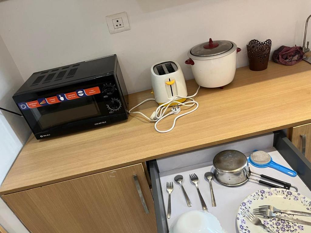 Kuchyň nebo kuchyňský kout v ubytování Coco Sunset View Luxury Suites