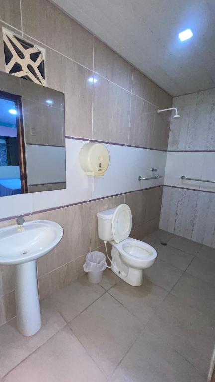 Koupelna v ubytování Hotel Opção