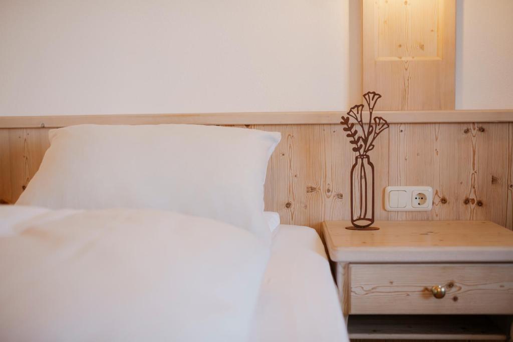 Postel nebo postele na pokoji v ubytování ALPENHOF Westerbuchberg