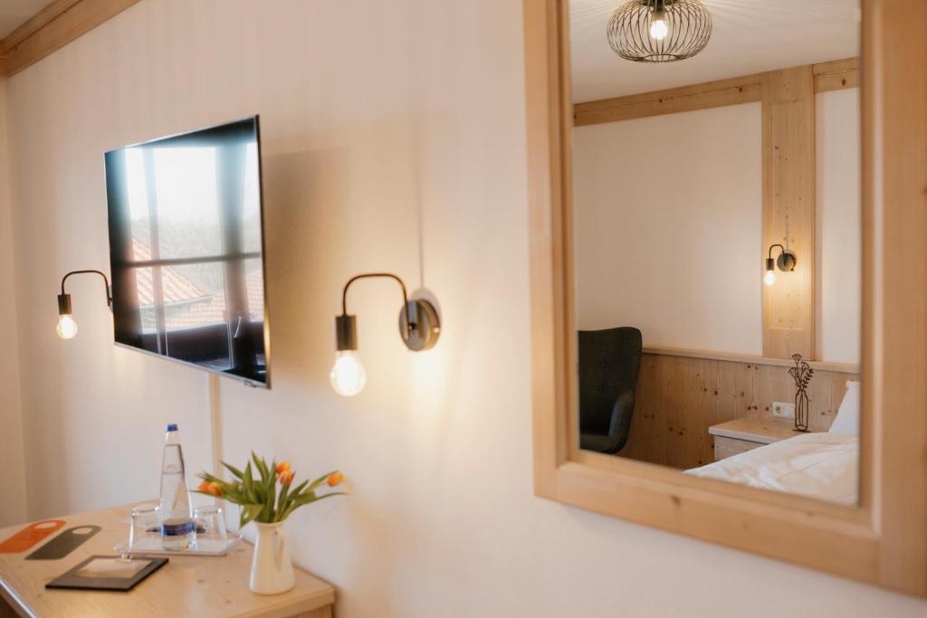 Postel nebo postele na pokoji v ubytování ALPENHOF Westerbuchberg