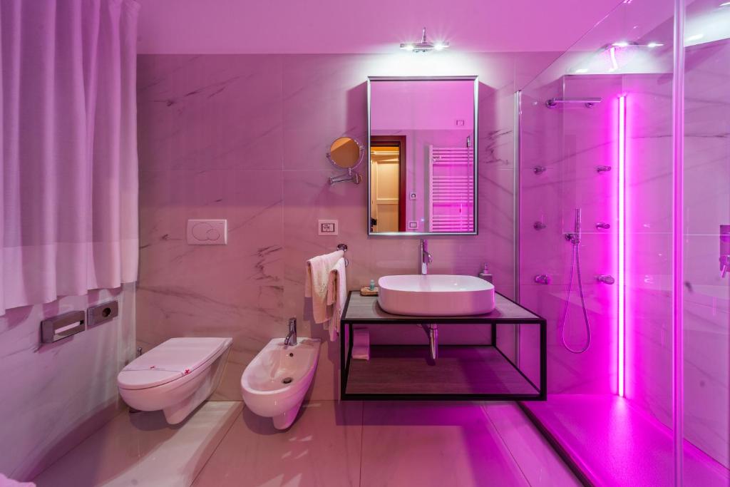 Koupelna v ubytování Tesoretto Hotel