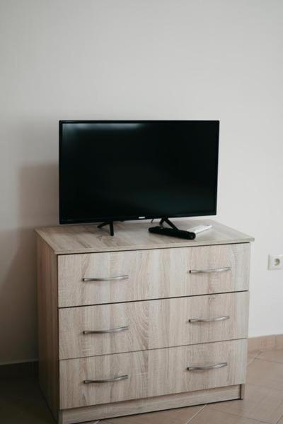 TV a/nebo společenská místnost v ubytování Welcome Villa Bazzar