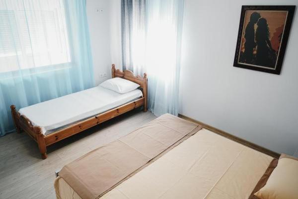 Postel nebo postele na pokoji v ubytování Welcome Villa Bazzar